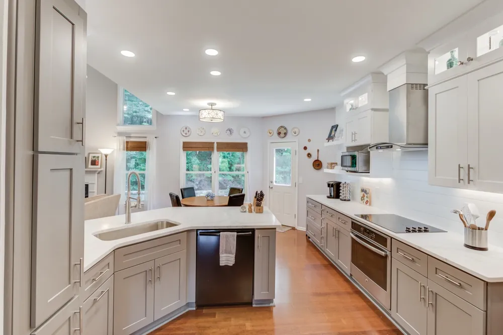 Gray lower cabinets with white upper cabinets